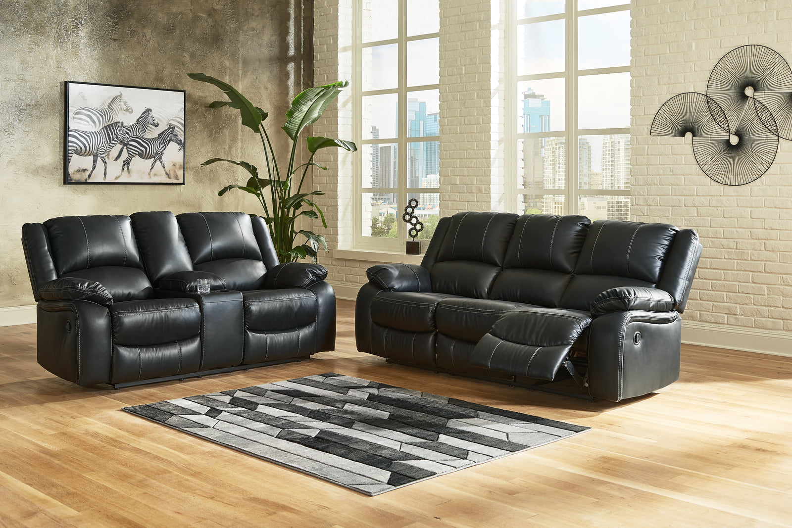 Calderwell Black Sofa Loveseat And Recliner