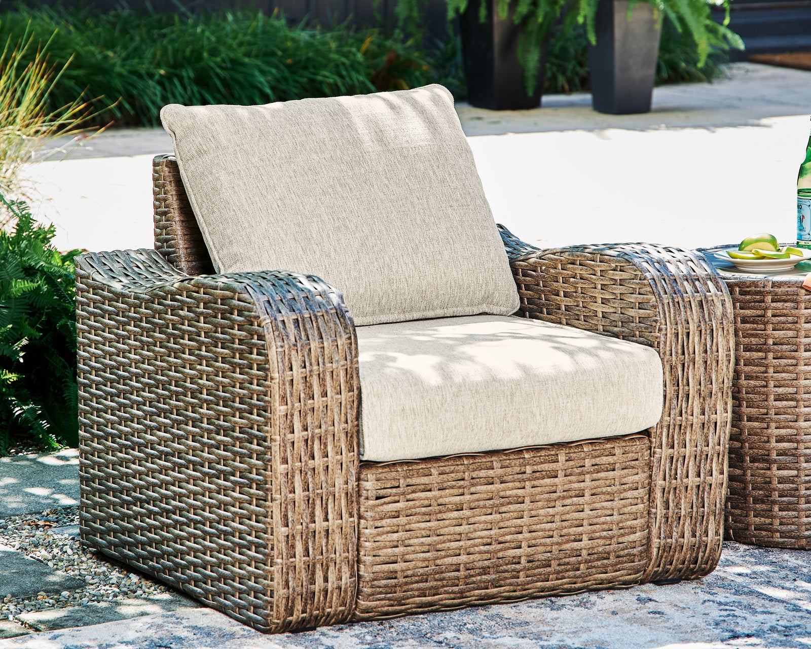Sandy Beige Bloom Outdoor Sofa And Loveseat With Lounge Chair And Ottoman
