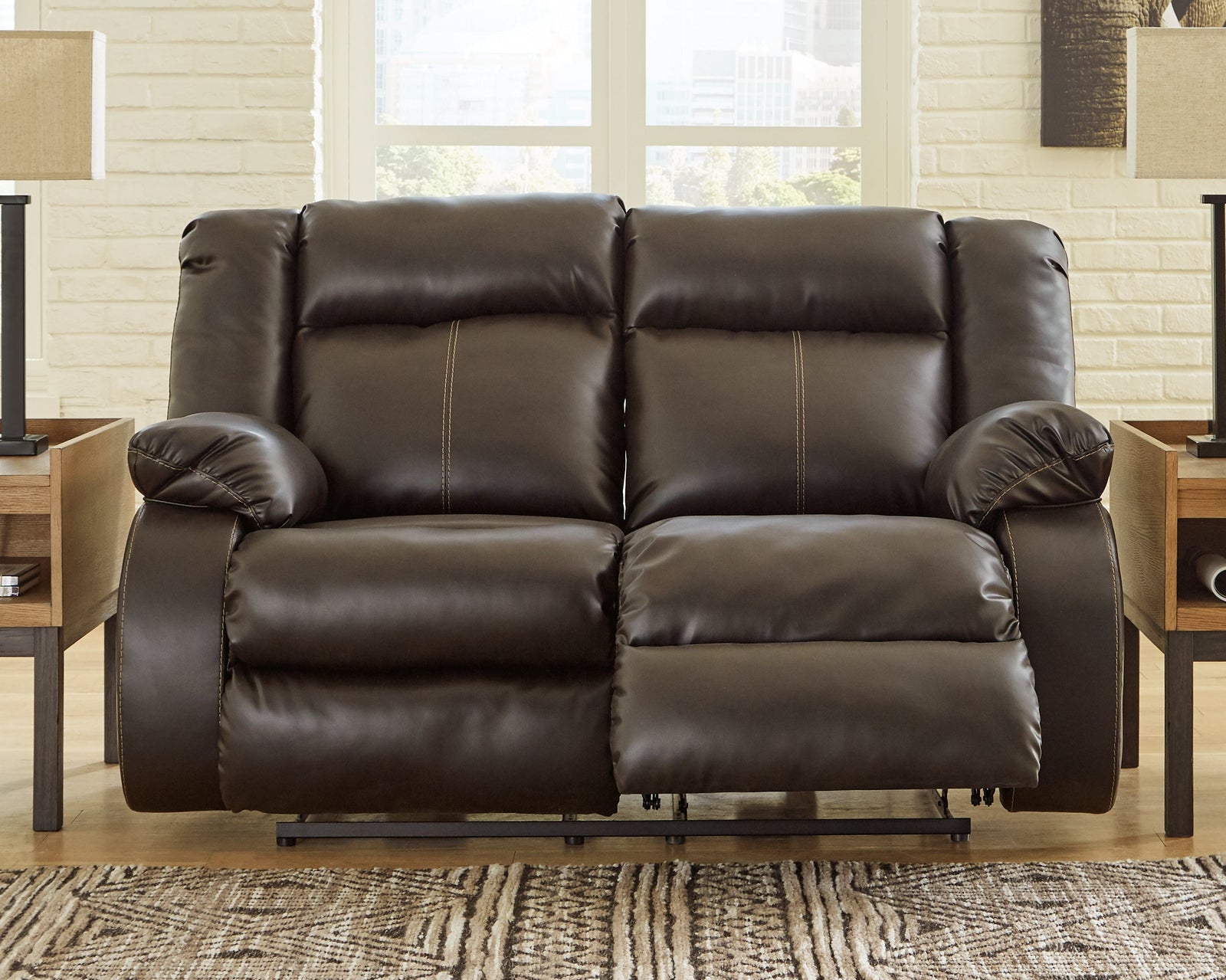 Denoron Chocolate Faux Leather Power Reclining Loveseat