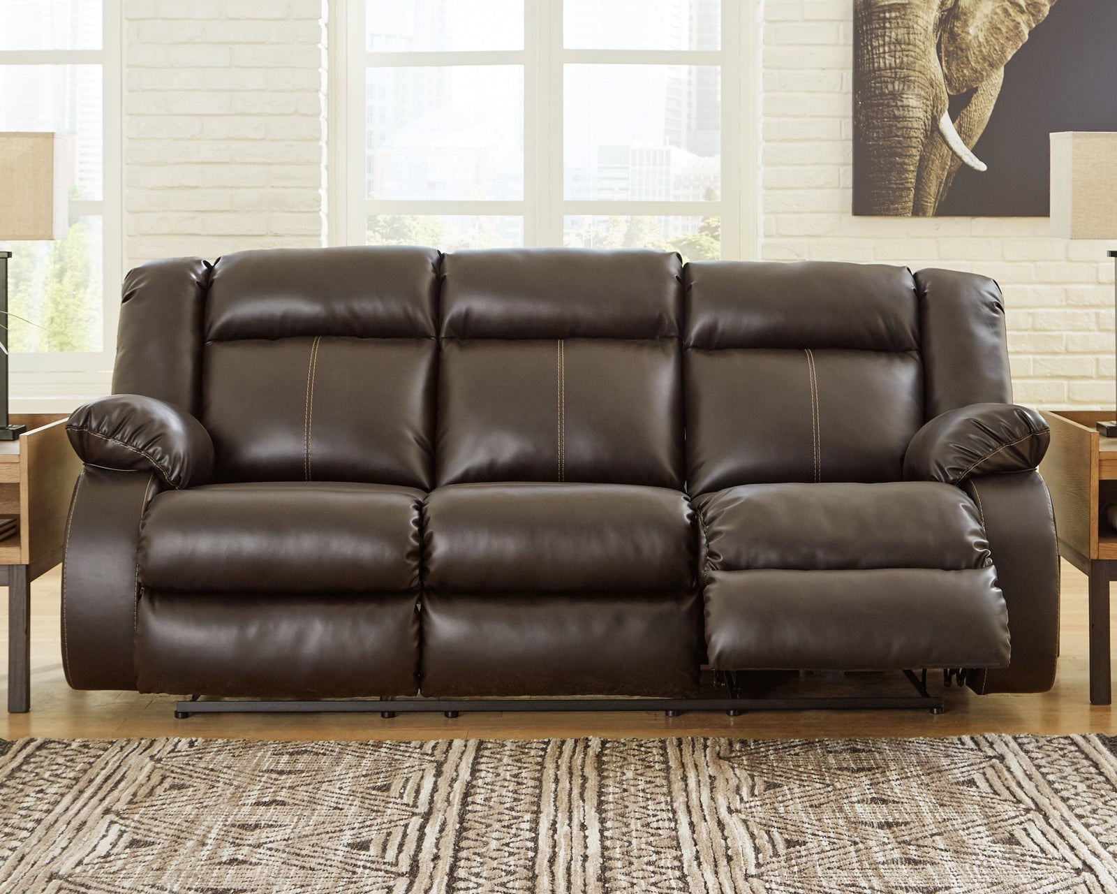 Denoron Chocolate Faux Leather Power Reclining Sofa