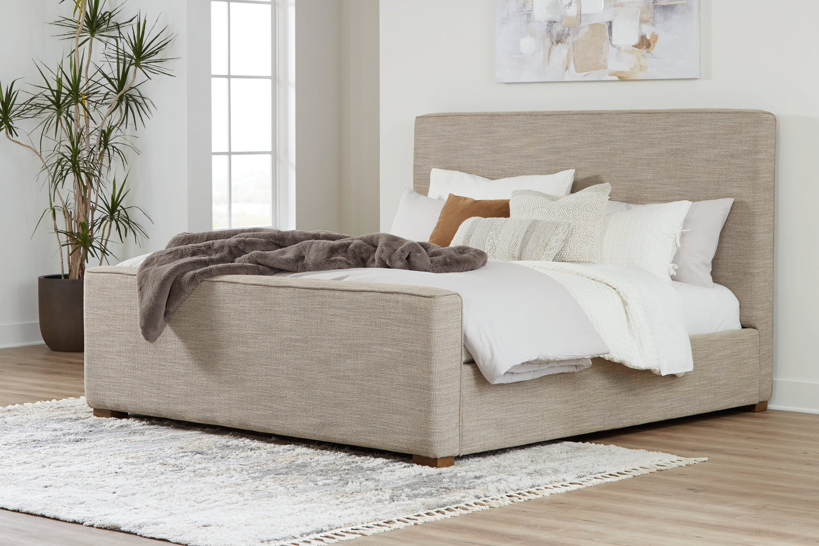 Dakmore Brown Queen Upholstered Bed