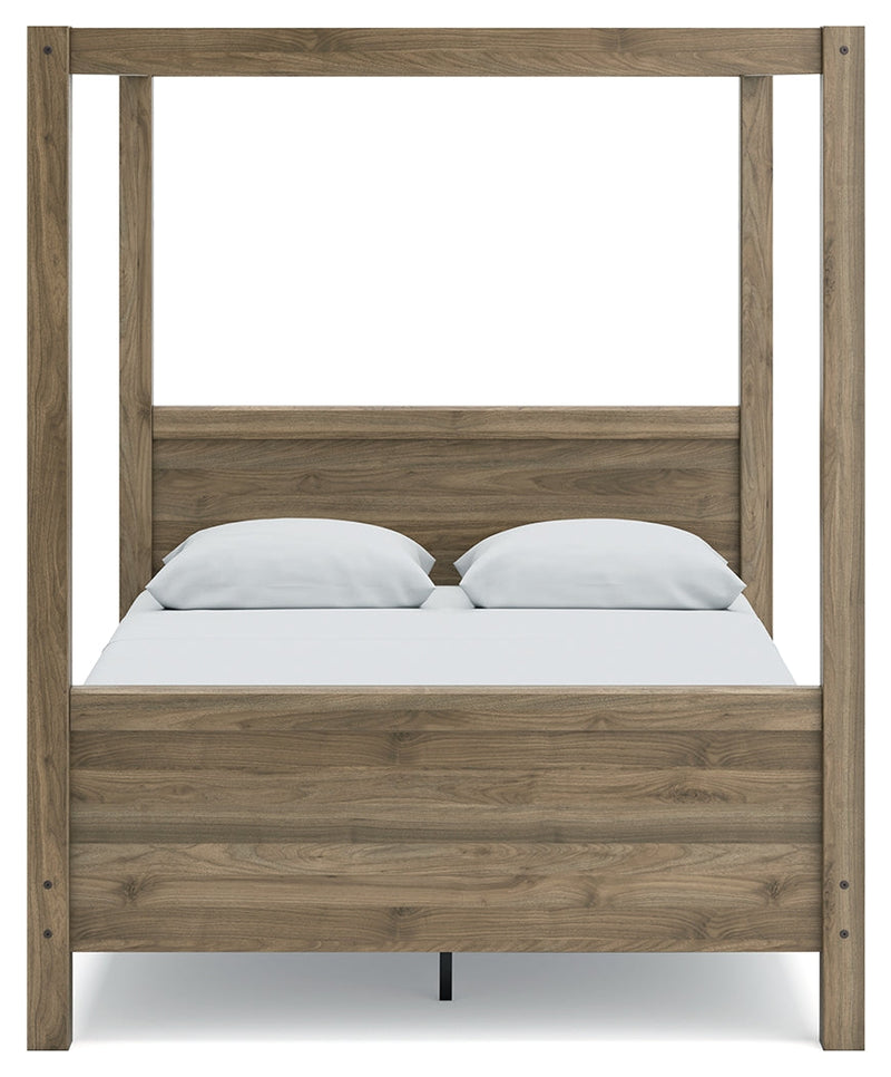 Aprilyn Honey Queen Canopy Bed