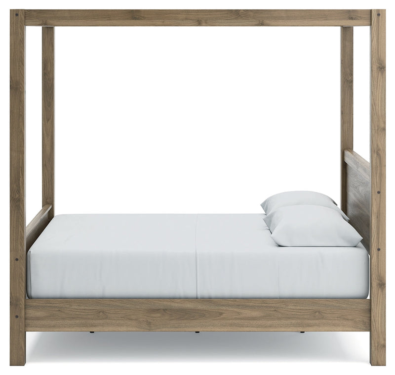 Aprilyn Honey Queen Canopy Bed