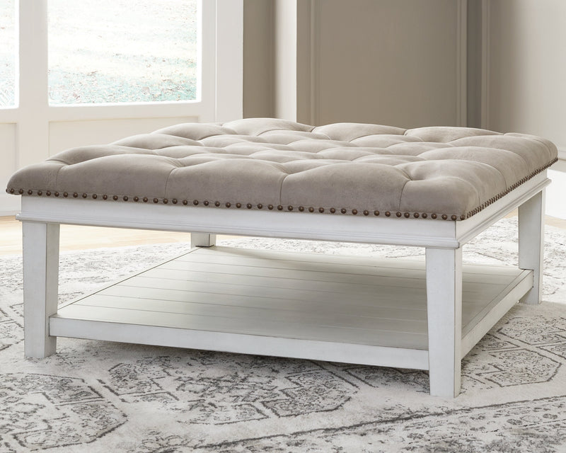 Kanwyn Whitewash Upholstered Ottoman Coffee Table